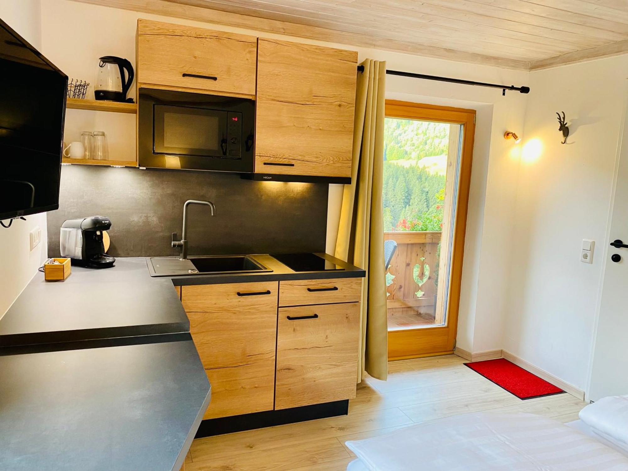Alm Seasons Premium Chalet & Studios 萨尔巴赫 客房 照片